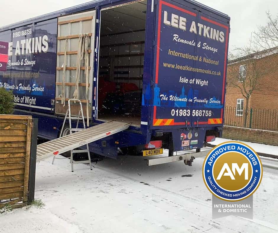 Island removals vehicle positioned outside a customer’s home